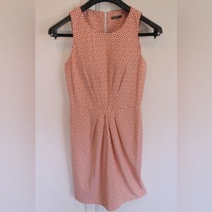 J. McLaughlin wrinkle free dress with geometric pattern and flattering style.